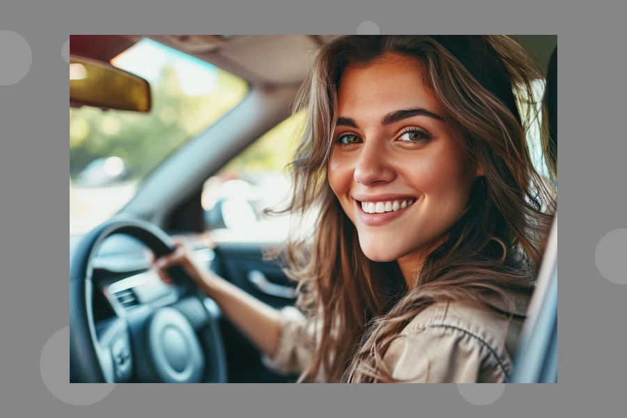 A Woman Driving A Car
