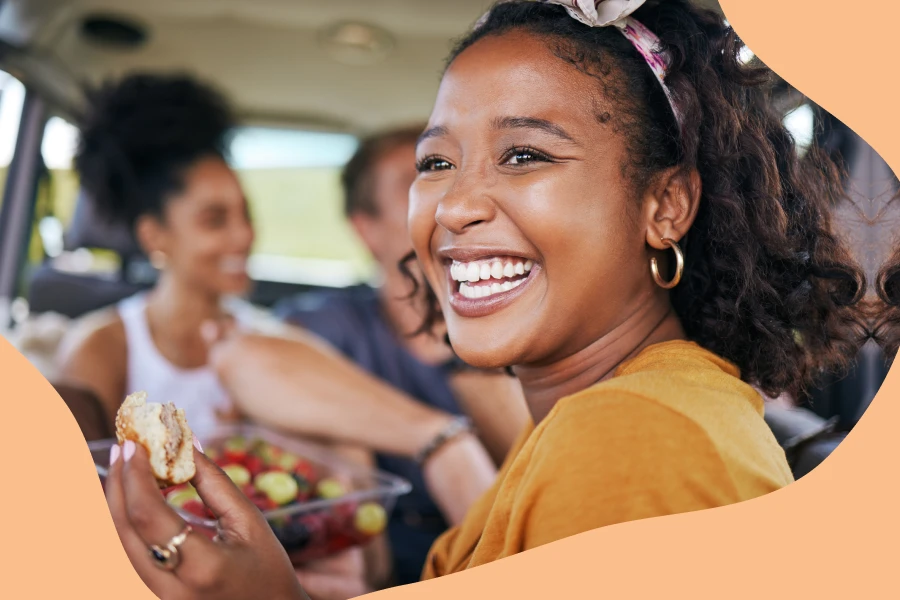 A Family Enjoy A Fresh Fruit and Hamburger In The Car