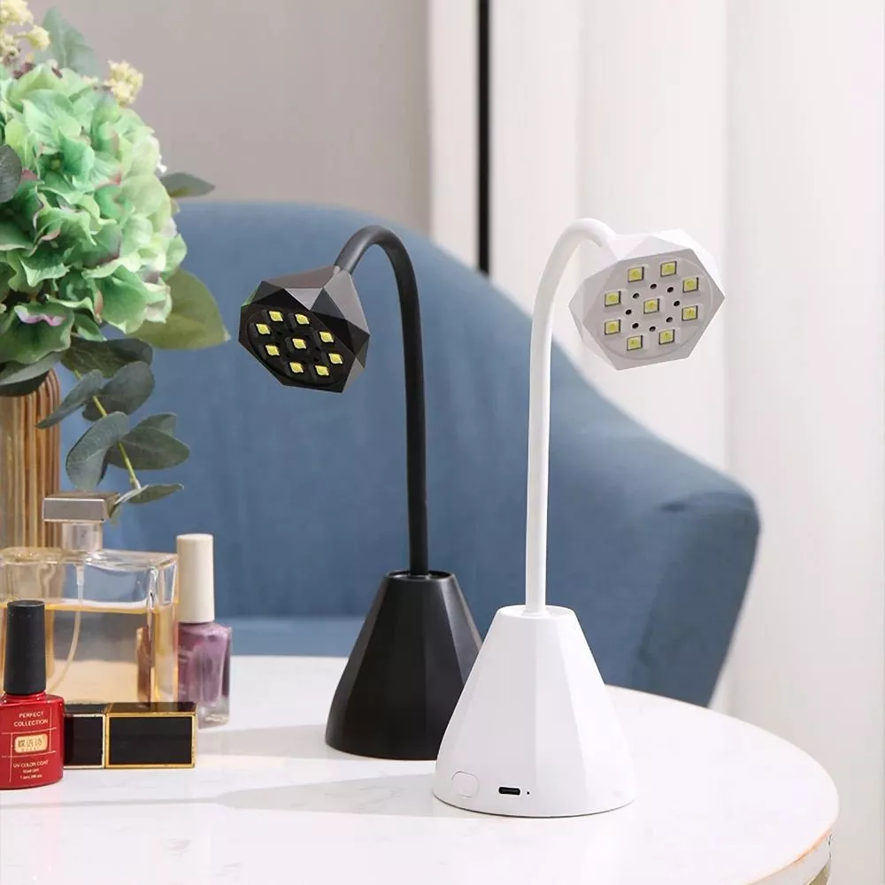 360° Flexible LED Nail Dryer – 27W UV Manicure Lamp with Rechargeable Battery 360° Flexible LED Nail Dryer – 27W UV Manicure Lamp with Rechargeable Battery